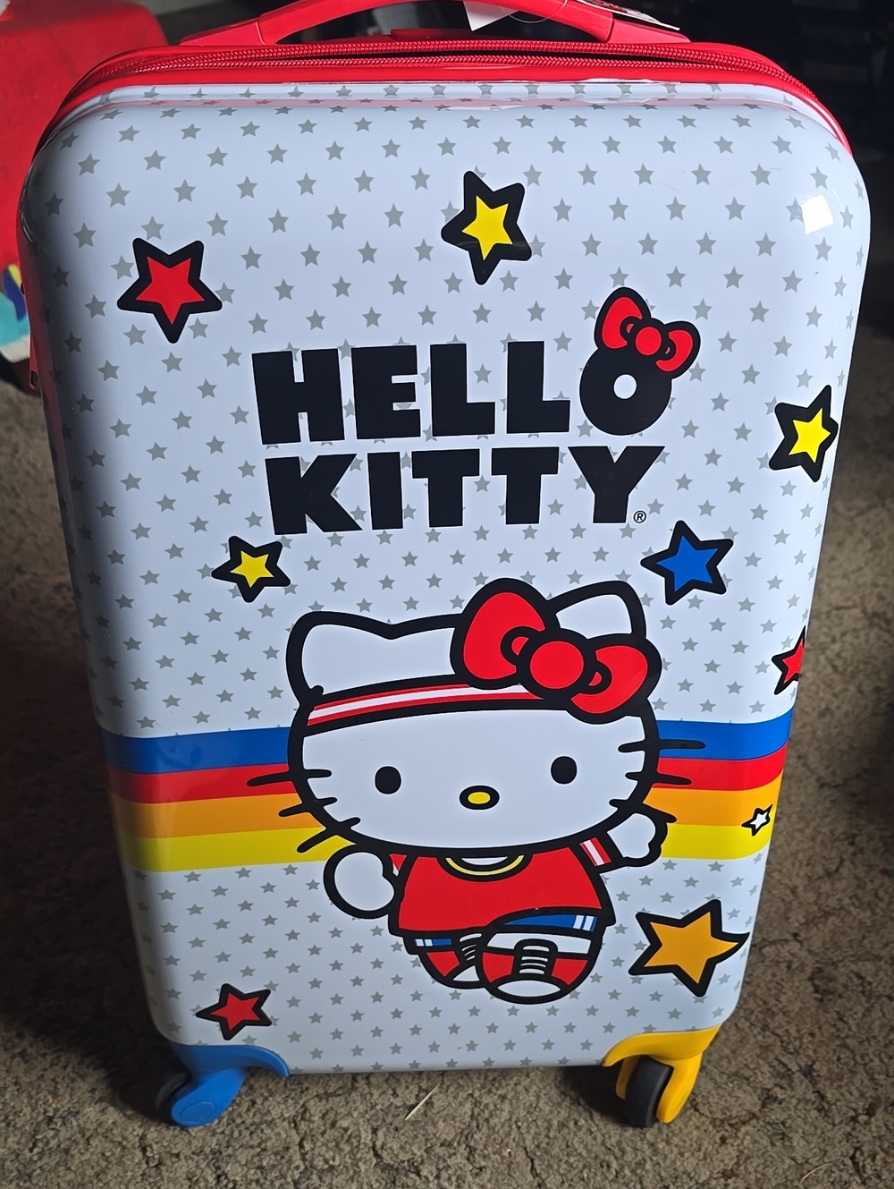 Sanrio Hello Kitty Rainbow Stripe Carry-On in White, Red, Blue, Yellow